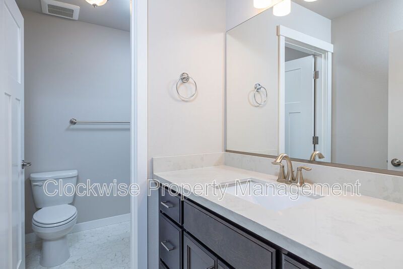 Gorgeous NEW 4 BR Duplex in Downtown Orting 2 car garage PLUS A/C property image